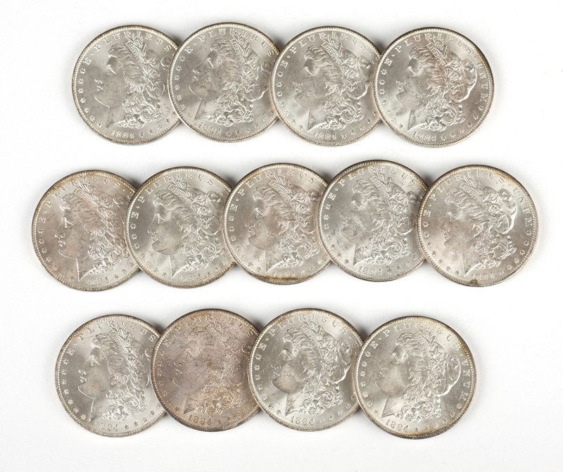 Group of 13 1884 O US Morgan Silver Dollars (1 of 3)