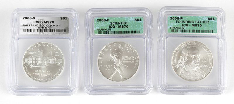 Three Graded US Silver Dollars (1 of 2)