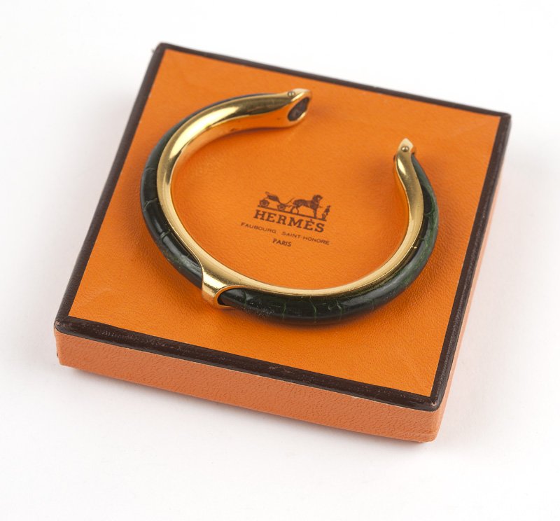 A gold-tone and dark green leather cuff, Hermes (1 of 3)