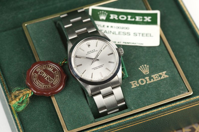 A Rolex Oyster Perpetual stainless steel watch (1 of 2)