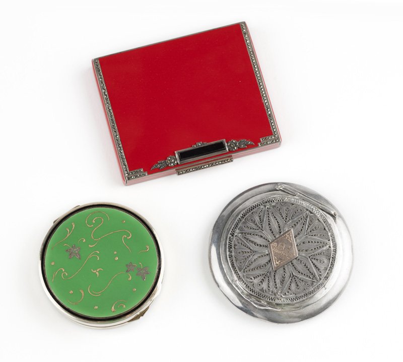 A collection of three silver compacts (1 of 2)