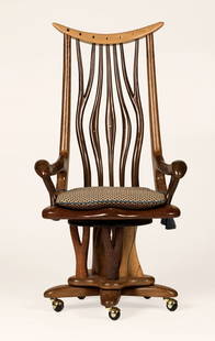 Steven Spiro (20th century- Madison, WI): ''Sculpture Garden Chair'', circa 2005, apparently unsigned, a hand-carved and inlaid swivel desk chair, with a curved crestrail inlaid with various woods in a moon phase motif, raised on rounded natu