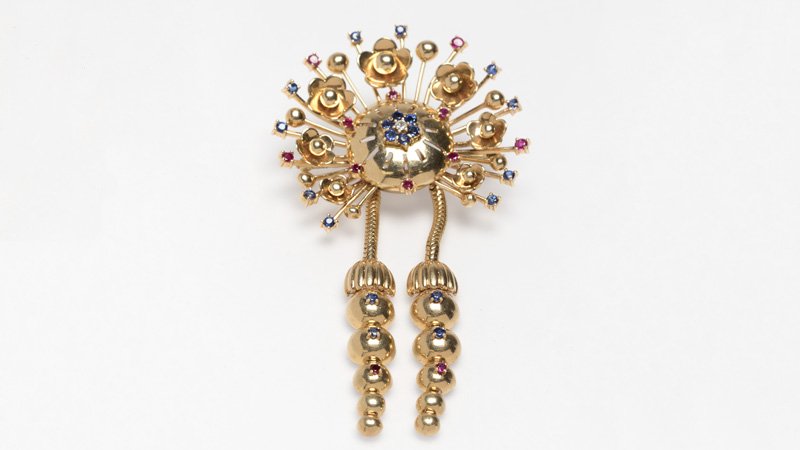 A Retro gem-set and gold floral brooch (1 of 2)