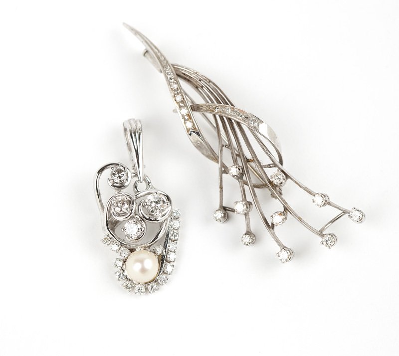 A group of white gold and diamond jewelry items (1 of 1)