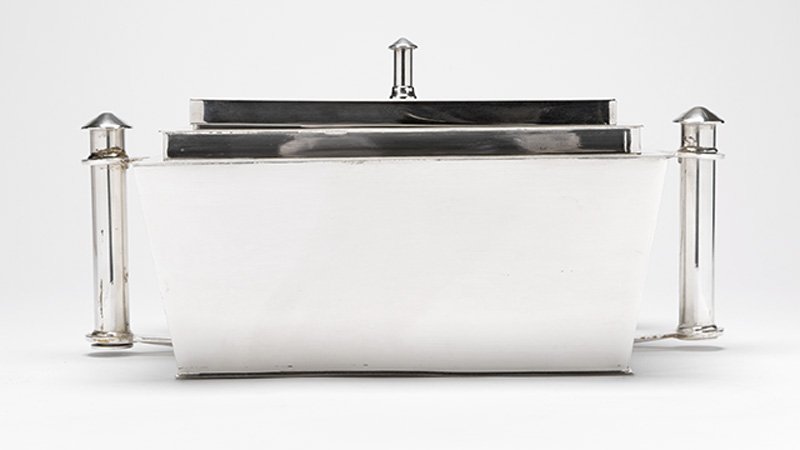 A silver-plated ''Skyscraper'' covered brazier: Circa 1920s, New York, designed by Louis W. Rice (1840-1909), with maker's marks of Apollo Silver Co. and Bernard Rice's Sons, Inc., further marked ''Skyscraper / Des. Pat. Pending / Made in U.S.A. /