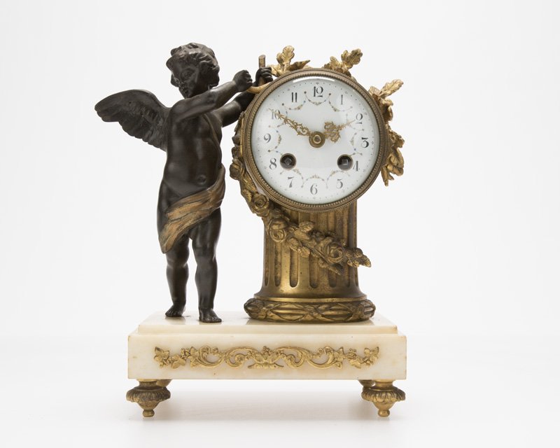 A Louis XVI-style bronze and marble mantel clock (1 of 4)