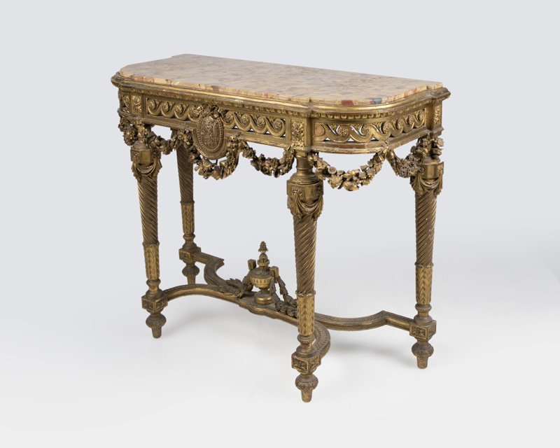A Louis XVI-style giltwood console table (1 of 2)