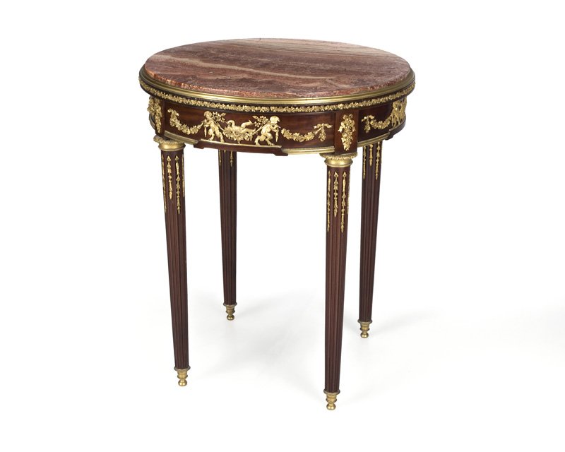 A Louis XVI-style gilt bronze-mounted lamp table (1 of 3)