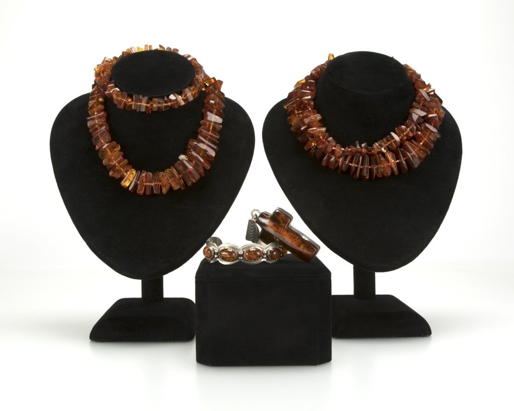 A group of silver and amber jewelry (1 of 3)