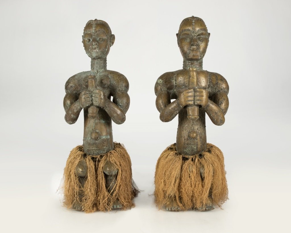 Pair of carved and brass-clad African sculptures (1 of 3)