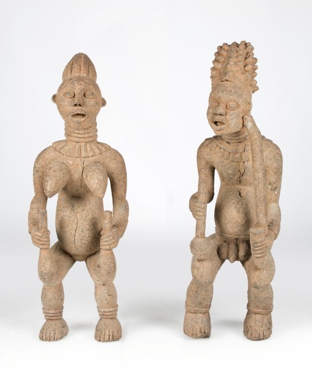 A pair of carved Bamileke-style African figures (1 of 3)