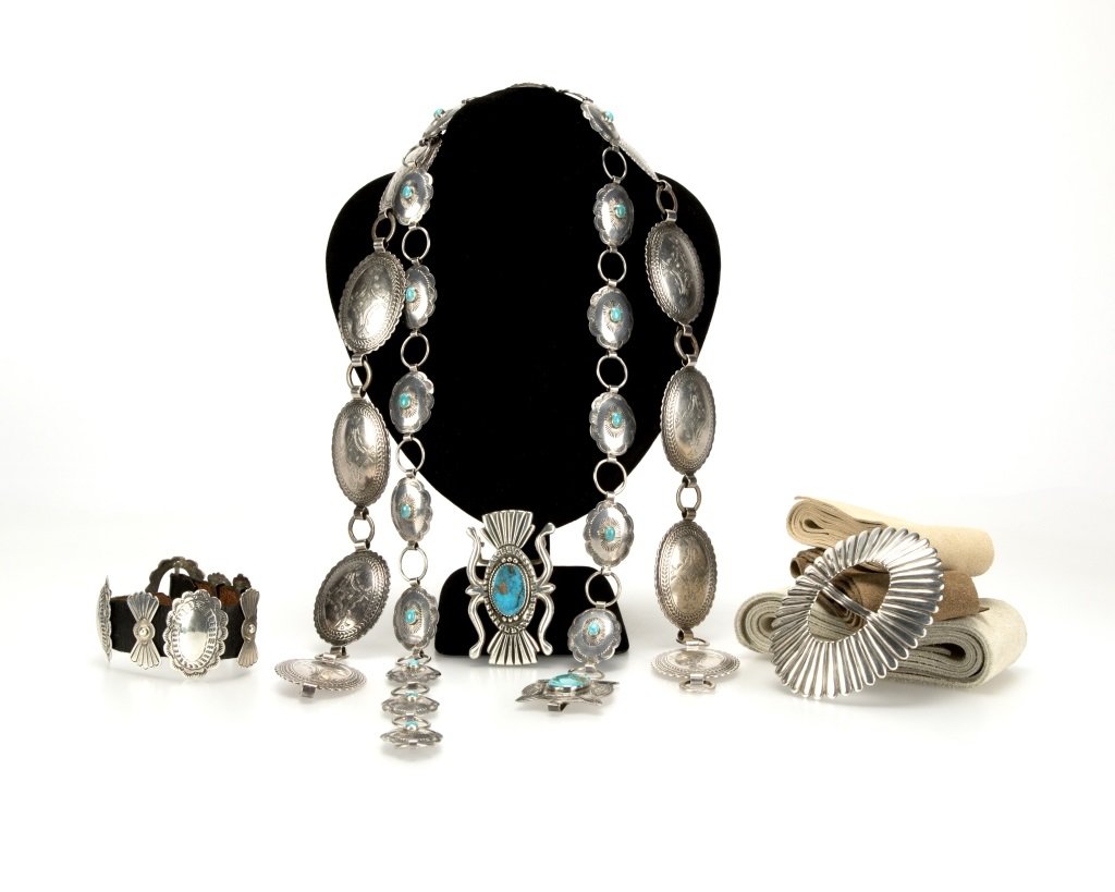 A group of silver belts, buckles and jewelry (1 of 5)