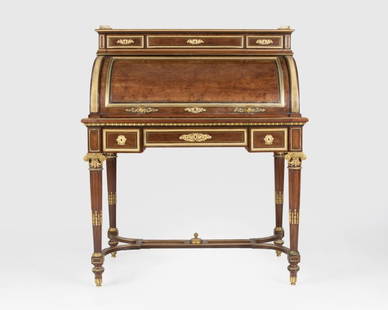 A Louis XVI-style roll-top desk, Fourdinois: Second half 19th century, Paris, stamped twice ''H. Fourdinois'' for maker Henri-Auguste Fourdinois (1830-1907), a gilt bronze-mounted roll-top desk, veneered in walnut, the rectangular galleried top