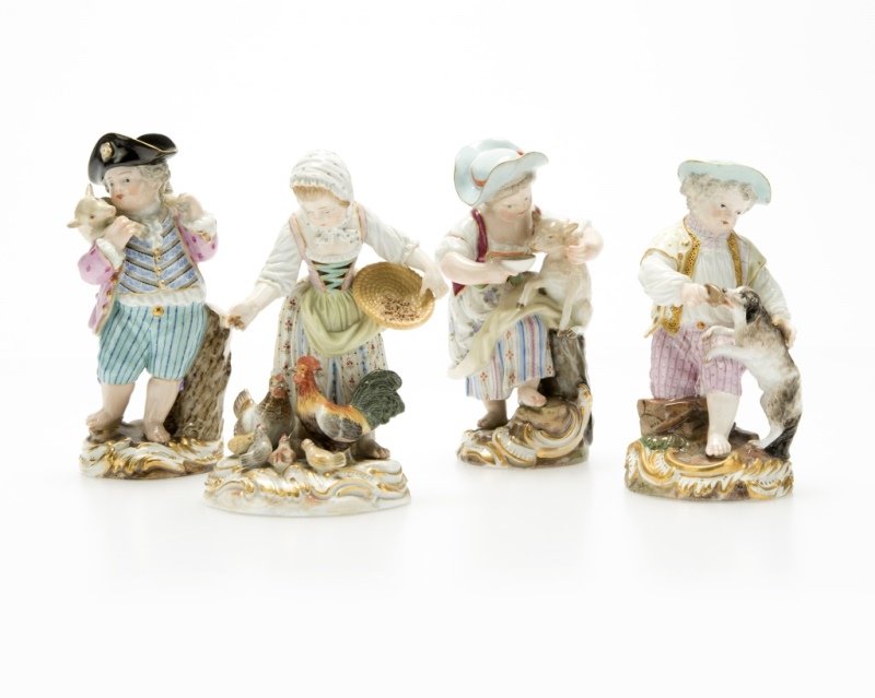 A group of Meissen porcelain figures: Late 19th/early 20th century, each with blue underglaze crossed swords mark, the first: incised model number ''2814'', depicting a girl feeding chickens; the second: incised model number ''F20'', mode