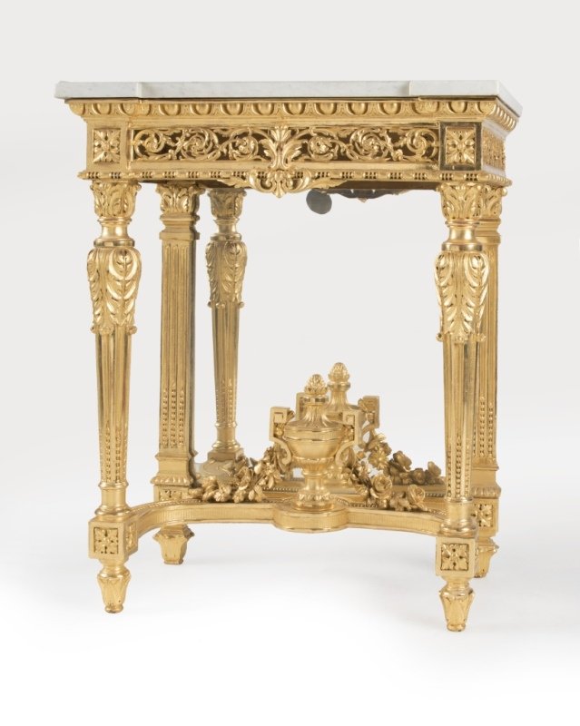 A Louis XVI-style carved giltwood console table (1 of 3)