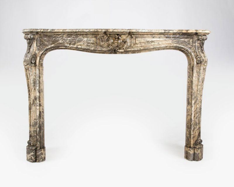 A gray marble fireplace surround (1 of 3)