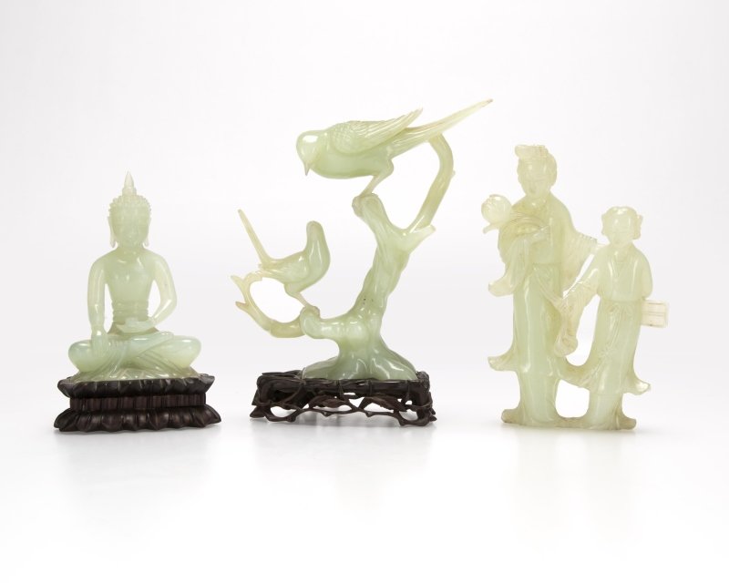 A group of Chinese carved jade figures (1 of 6)