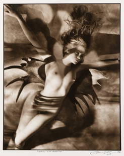 George Holz (1956-* Catskill, NY): ''Claire with Moosewings'', signed and dated lower right margin: George Holz / 1986, titled lower center margin, toned silver gelatin print on paper under Plexiglas, image size: 18.75'' H x 15'' W, es