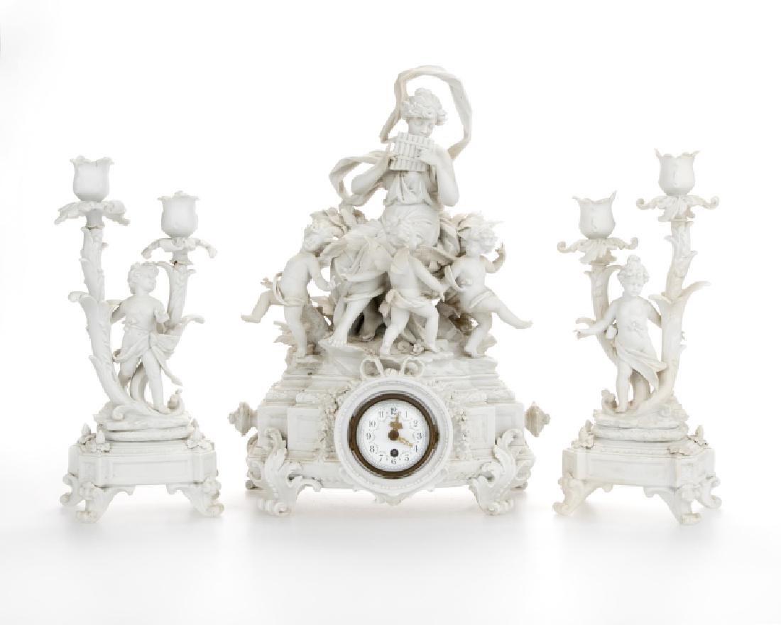 A Sevres bisque mantel clock and garniture set (1 of 6)