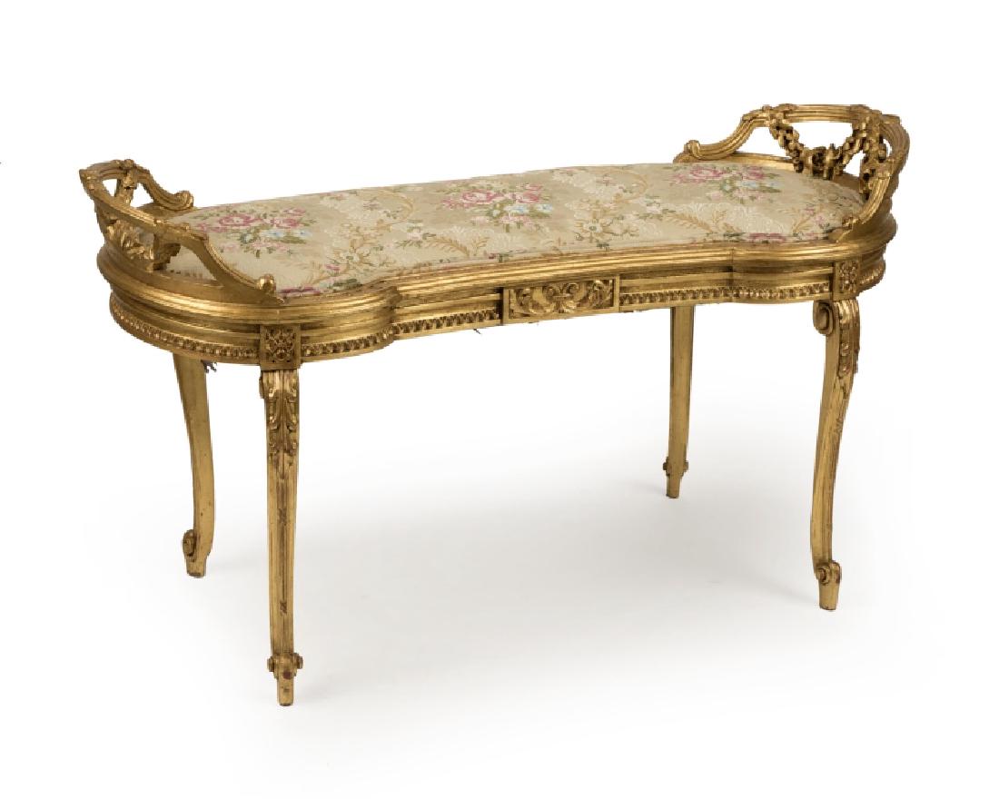 A French Louis XV-style carved giltwood bench (1 of 1)