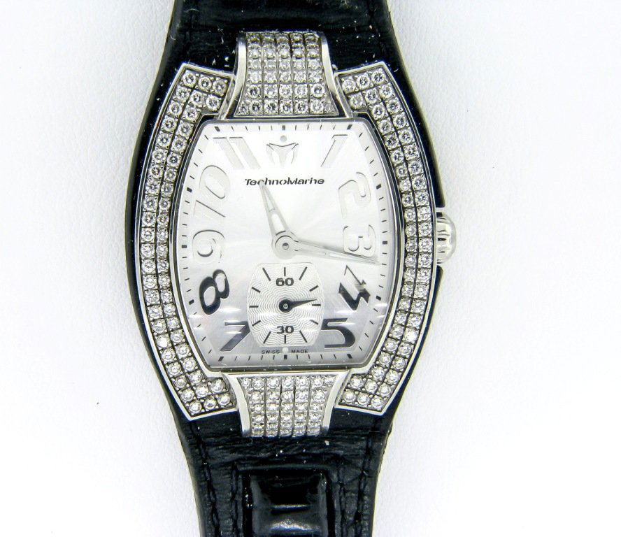 Laides TechnoMarine Watch with Diamonds: Swiss made technomarine watch with diamonds, and a black Alligator leather band.