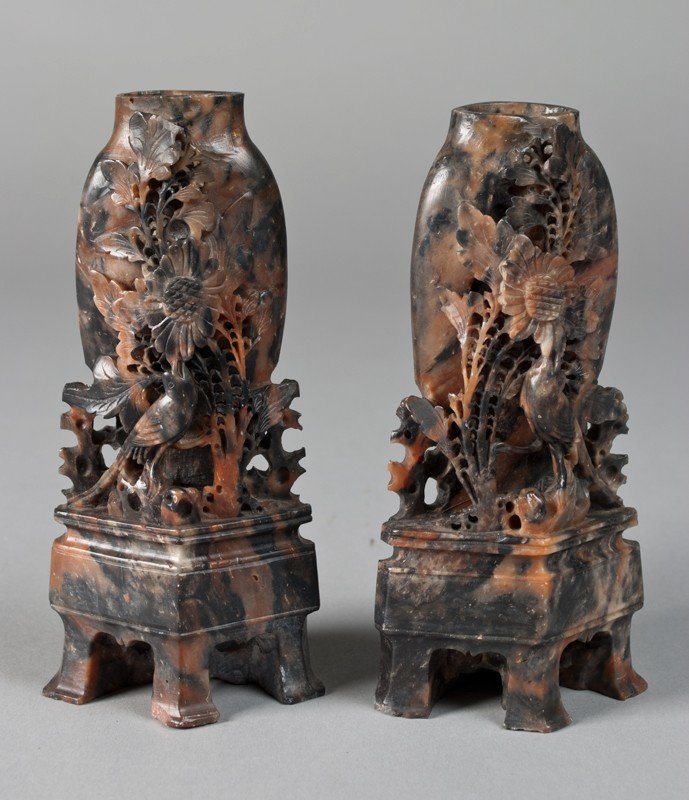 Pr. Antique Of Chinese Carved Soapstone Vases: Both finely carved of urn form with carved lotus and standing Phoenix, both raised on carved bases. Tallest 6.75" H, small chip to foot of taller. Circa mid 19th/early 20th century. Private collection