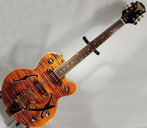 Epiphone Wildkat Electric Guitar Ltd Edition Gold !: Rare and very nice guitar almost brand new 1-Epiphone Wildkat Electric Guitar w/ Gold Hardware New! Details: Epiphone Wildkat Electric Guitar Aged Tiger w/ Gold Hardware. This strikingly beautiful, Li