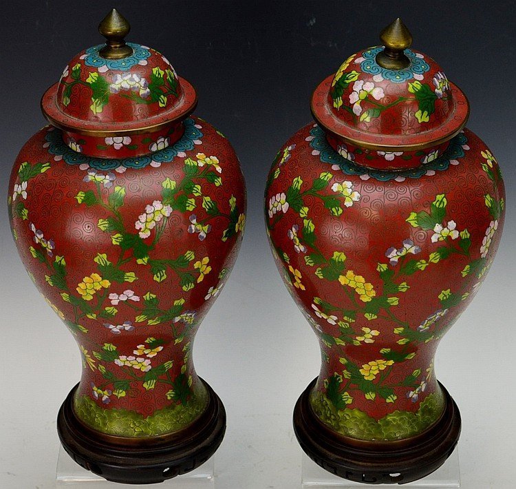 Exquisite Pair of Qing Dynasty Cloisonne Meiping Vase: Wonderful matching pair of cloissone vases with rare red color, Chinese Qing Dynasty . Measure 11.75" x 6" One has minor loss to neck under lid and small dent to opening ,come with matching cover and