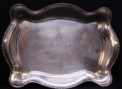 Tiffany & Co. Sterling Footed Tray: Tiffany & Co., Sterling Silver scroll footed tray with beaded rim inscribed "E.F.H." weighs 24.8 ounces, 14' X 10" X 1 1/4"