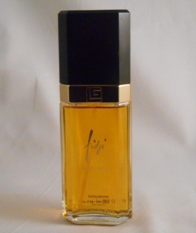 Guy Laroche Paris "Fidji" Fragrance: Guy Laroche Paris "Fidji" Fragrance. This is a hard to find bottle. The bottle is in excellent condition. The bottle is marked 100 ml and stands 6.5" tall.
