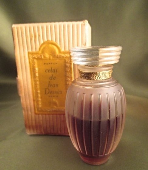 Jean DESSES CELUI Perfume 1 Oz Sealed Presentation Box: Antique Very Rare Jean Dress CELUI PARFUM 1 Oz 30ml 3.5" tall - I believe this is a 1 Oz bottle, but it is not marked.JEAN DESSES Shell PRESENTATION BOX. Very Beautiful Soft French Floral Perfume Very