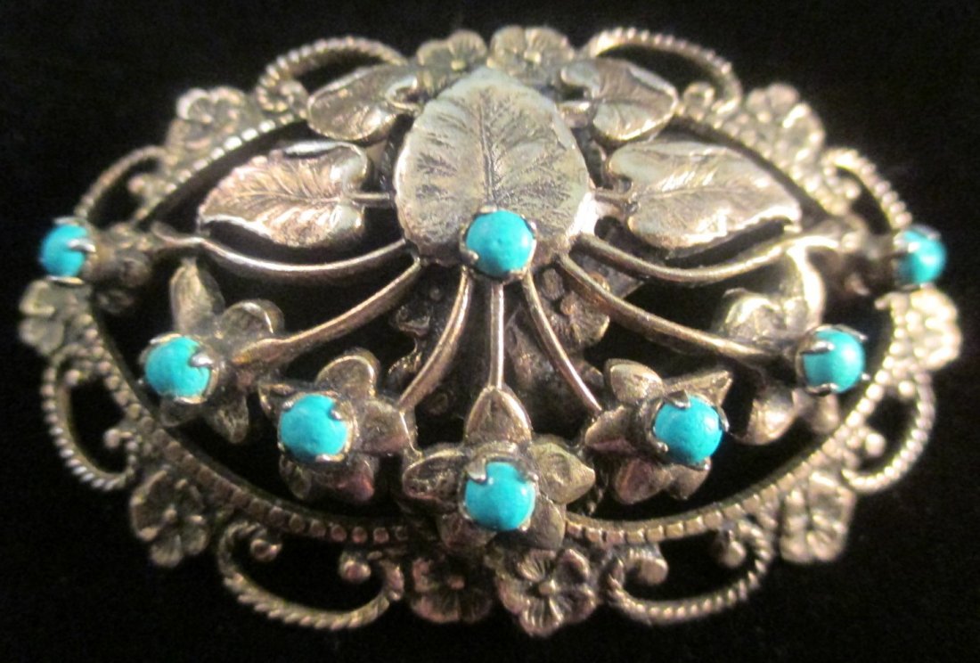 SANDOR CO. Antique Victorian Turquoise Brooch: Beautiful Gold Tone Victorian Inspired Botanical Motif Brooch Pin with Faux Turquoise Beads - Signed SANDOR CO. Sandor Co. was in business from 1938 through circa 1972. Measures 2 1/4"w x 1 1/4"h. In 