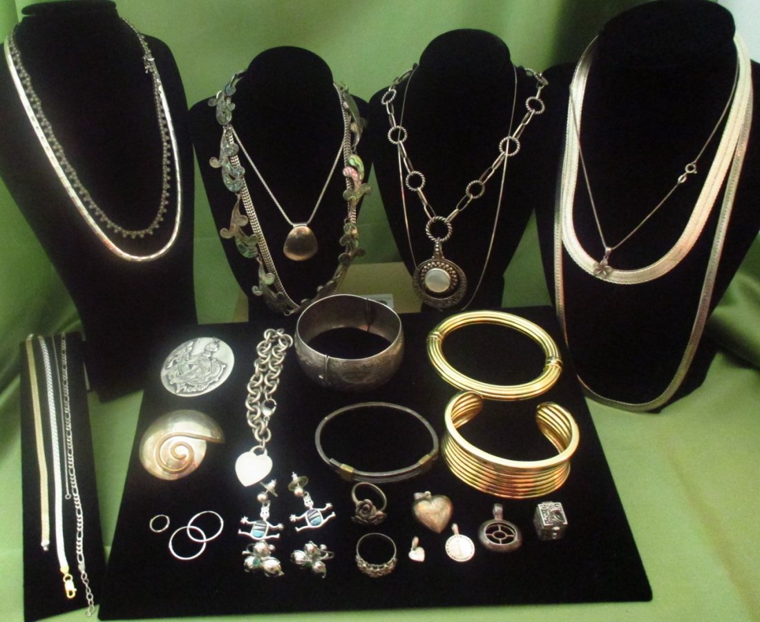 Sterling Silver 513.0 g.Tiffany, Judith Jack, Dominguez: Lot of Sterling Silver Jewelry which includes : A Rare Rock critter earrings, Tiffany sterling silver bracelet, sterling silver 925 and Marcasite Judith Jack chain, Hecho En Mexico MSA 35 Abalone Shel