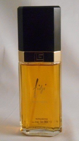 Guy Laroche Paris "Fidji" Fragrance: Guy Laroche Paris "Fidji" Fragrance. This is a hard to find bottle. The bottle is in excellent condition. The bottle is marked 100 ml and stands 6.5" tall