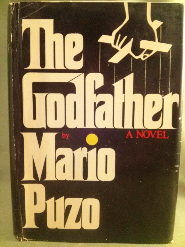 Mario Puzo THE GODFATHER first edition 1968: Mario Puzo THE GODFATHER first edition seventh printing; copyright 1968 by Mario Puzo, Published by G.P. Putnam and Son. original un clipped dust jacket which is priced at "$6.95" with "6903".