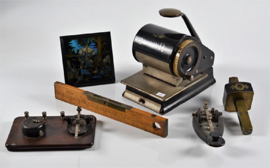 LOT OF DECORATIVE ACCESSORIES: Including a vintage adding machine by Security, a butterfly wing framed picture, ruler with level, two morse code machines.