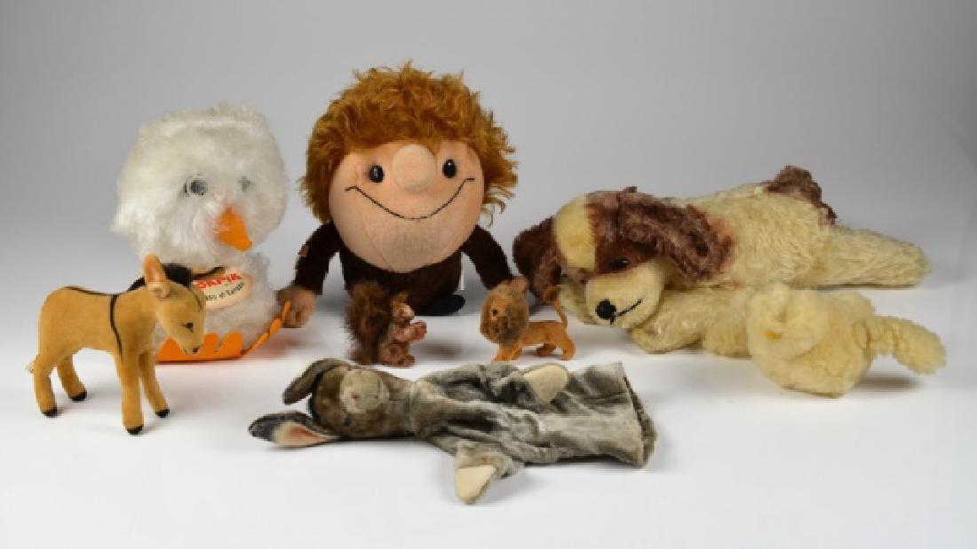 A LOT OF VINTAGE STUFF ANIMAL TOYS: Including a Bigo Bello Schuco Ding character, dog with rattle in paw, Reliable Ookpik 1963, a donkey and beaver.