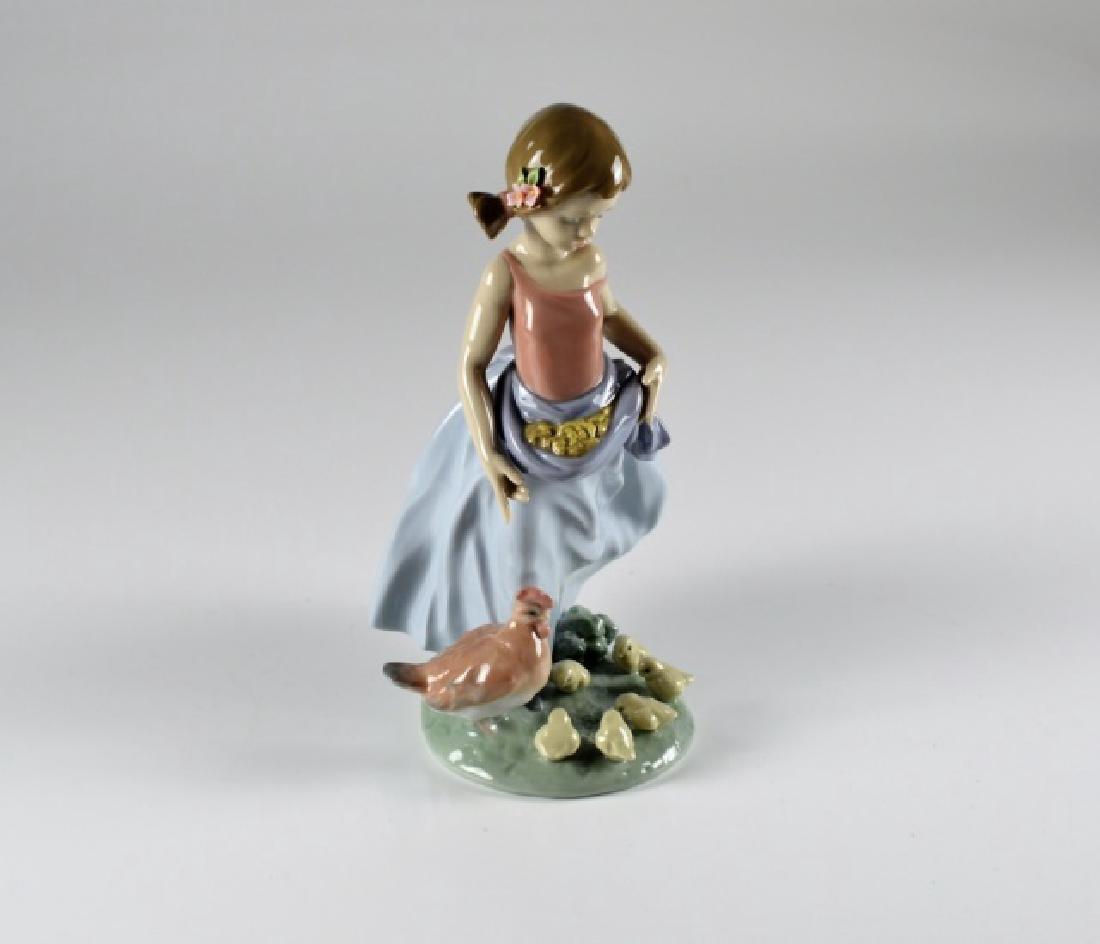 TWO LLADRO FIGURINES (1 of 5)