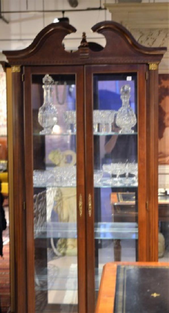 CURIO CABINET: With mirrored back, adjustable shelves and interior lighting.