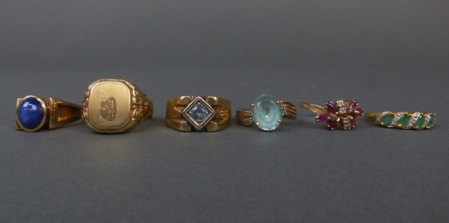 Six 10k gold rings with stones, 32 g.