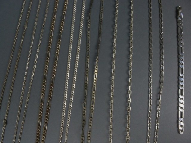Lot of silver chains & bracelets: Including one chain with some silver pendants Total weight 175 g.