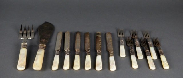 Silver plate and mother of pearl flatware: Silver plate and mother of pearl flatware - with silver collars