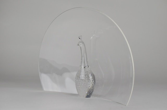 STEUBEN GLASS PEACOCK: Designed by Joel Smith. Patten # 8532. Incised Steuben signature at base.