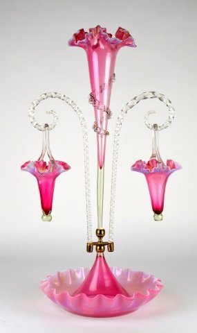 VICTORIAN CRANBERRY GLASS EPERGNE: With 2 hanging baskets. (crack and piece out of one). Ht. 57 cm. (22.5 in.)