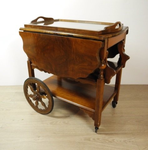 WALNUT DROP LEAF TEA TROLLEY: Having one drawer, removable drinks tray and shaped drop leaves.