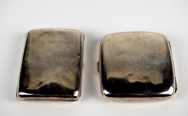 TWO SILVER CIGARETTE CASES: 1 monogrammed and hallmarked Sheffield 1908 and the other inscribed Lieut. Col. J. H. Mead (e)?. Wt. 174 grams