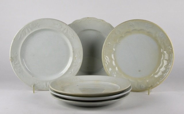 SIX 19TH C. WHITE IRONSTONE PLATES: Various patterns and makers. Diam of largest: 25 cm. (9 3/4 in.)