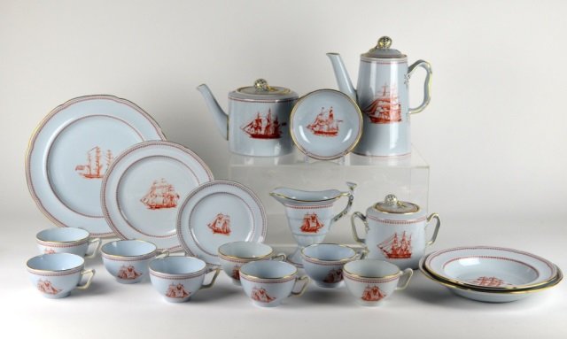 63 PIECES OF COPELAND SPODE RED TRADE WINDS: 13 dinner plates, 12 salad/luncheon plates, 11 sides, 4 lg shallow bowls, 5 medium shallow bowls, 6 finger/fruit bowls, coffee pot, tea pot, covered sugar, creamer and 8 tea cups.