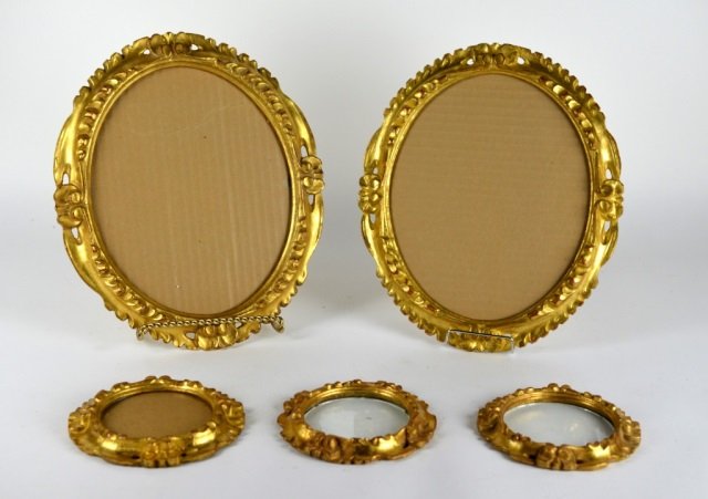 FIVE GOLD FLORENTINE PICTURE FRAMES: Including pair of matching oval frames and 3 matching smaller round frames. Length of larger 30.5 cm. (12 in.)