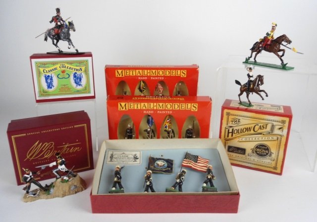 BRITAIN AND OTHER METAL SOLDIERS: 2 "Metal - Models" M.I.B., Hollow Cast soldier on horse in box, Crimeon War series composite figure in box, Classic Miniatures set in box, & Classic Collection horse with rider. Longest box length 24